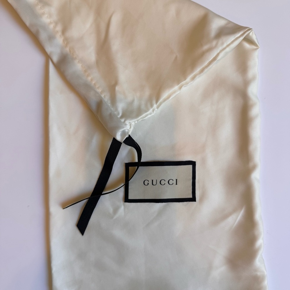 Satin Gucci dust bag